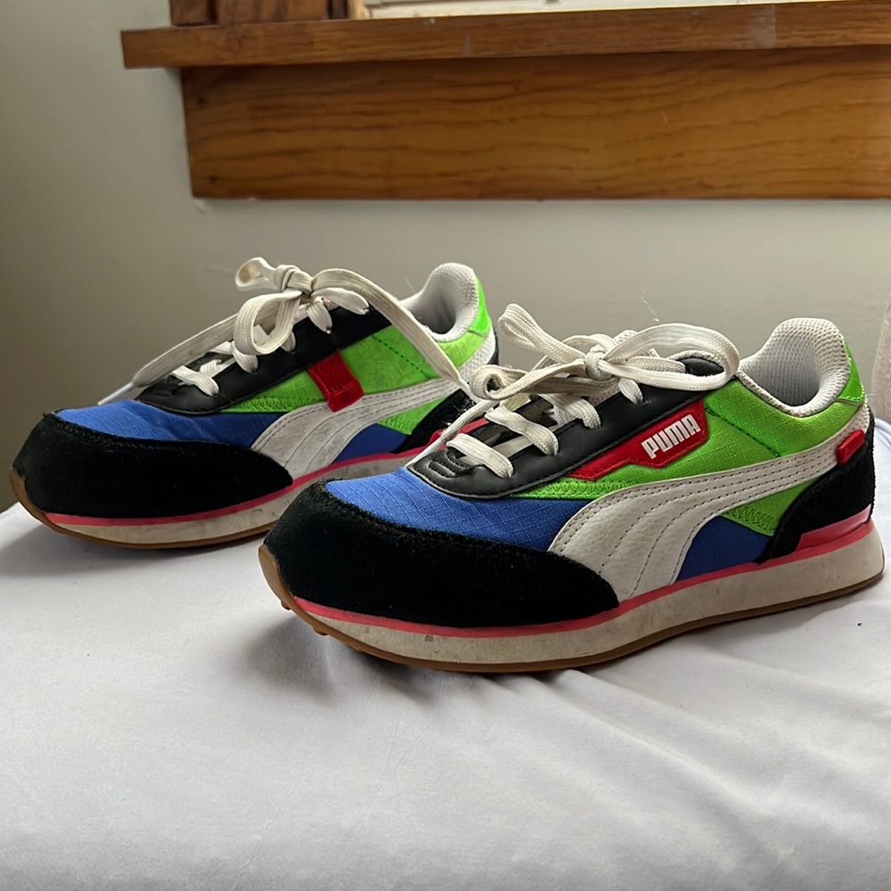 Kids puma shoes.